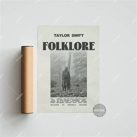 the front cover of taylor swift's folklore magazine, with a roll of ...