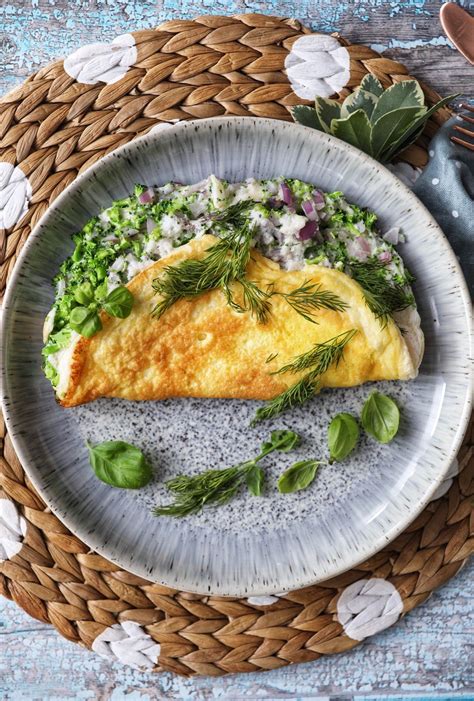 The Fluffiest Omelette With Broccoli Red Onion White Cheddar And Feta