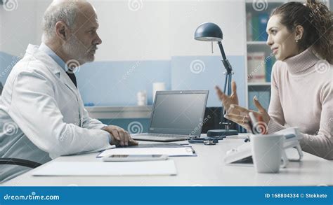 Doctor And Patient Meeting In The Office Stock Photo Image Of Illness