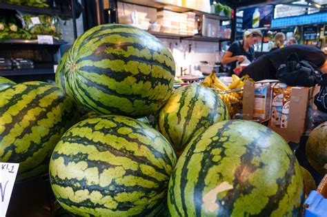 Purchasing Watermelons In Supermarket Free Photo