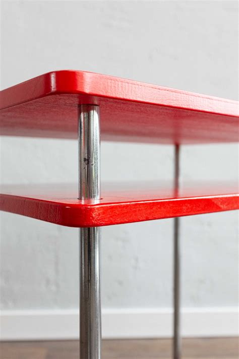 Functionalist Red Chrome Table Renov