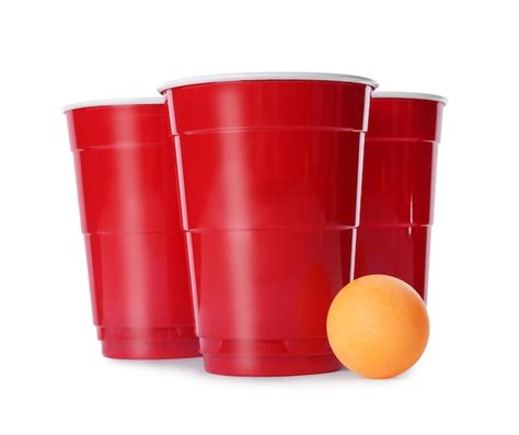 Premium Photo Red Plastic Cups And Ball For Beer Pong On White Background