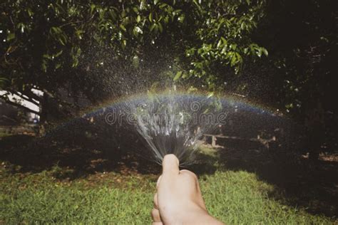 Spraying Water To Create Rainbow Stock Image Image Of Rain