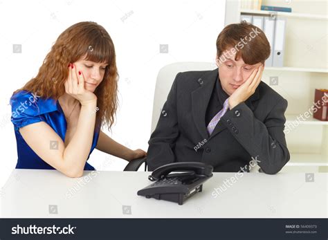 People With Impatience Wait For Your Call At Office Stock Photo