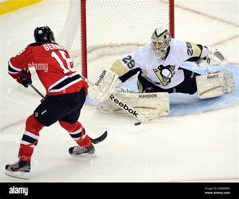 Pittsburgh Penguins Goaltender Marc Andre Fleury Right Makes A Save