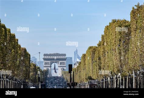 The Champs Elysees Avenue Heading To The Arc De Triomphe In Paris