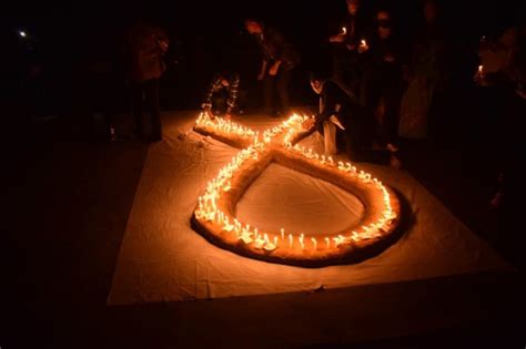 International Aids Candlelight Memorial Service Held At Fac