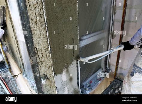 plasterer plastering  exterior wall stock photo alamy