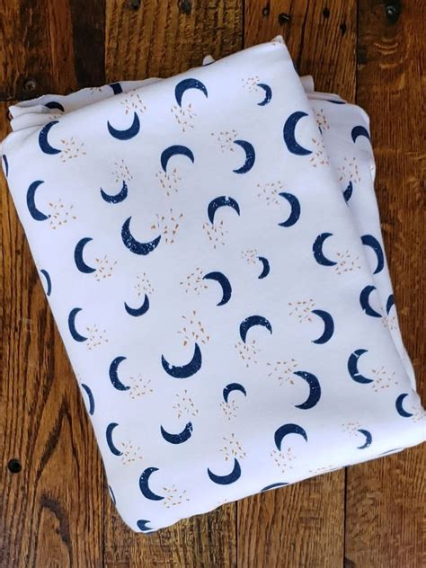 Navy Moons On Ivory French Terry Poly Rayon Spandex