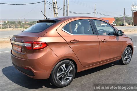 Tata Tigor petrol rear three quarter highway First Drive Review