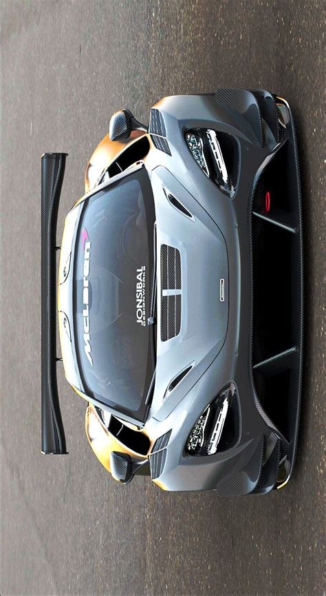 an overhead view of a silver sports car