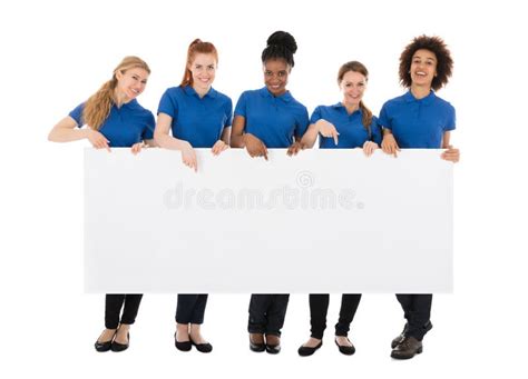 Group Of Young Janitors Gesturing Thumbs Up Stock Photo Image Of