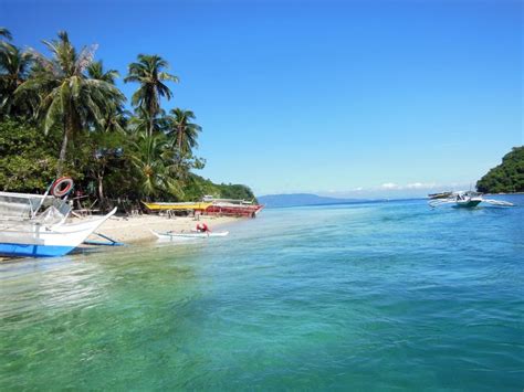 Boat transfer to Coco Beach resort, Philippines | Beach resorts, Beach, Beautiful beaches