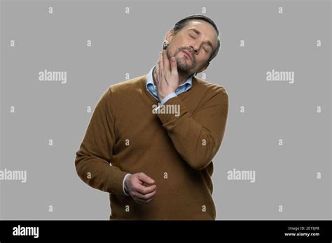 Mature Man Suffering From Neck Ache Stock Photo Alamy