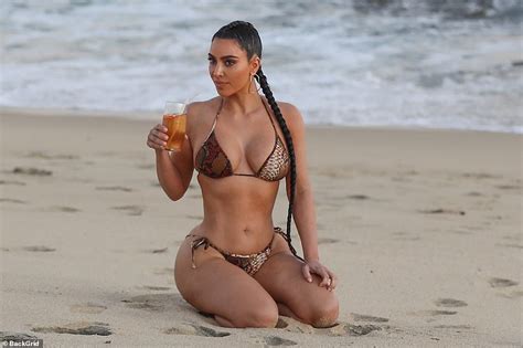 Kim Kardashian Gets Back To Work During Malibu Bikini Shoot As Kanye West Returns To Campaigning