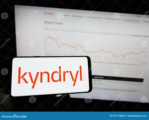 Person Holding Mobile Phone With Logo Of Technology Company Kyndryl