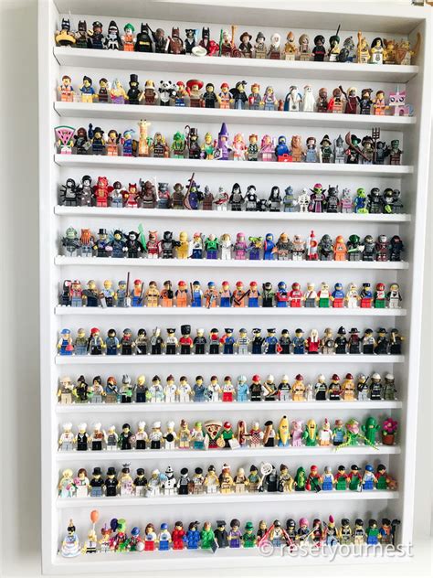 A White Shelf Filled With Lots Of Toy Figurines