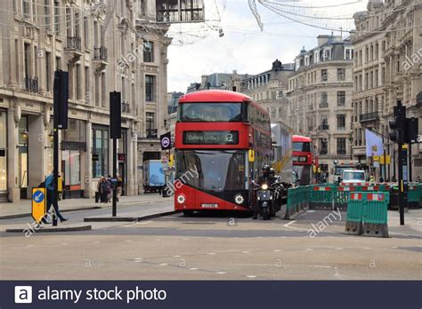 Red Double Decker Buses On Oxford Circus And Regent Street Daytime