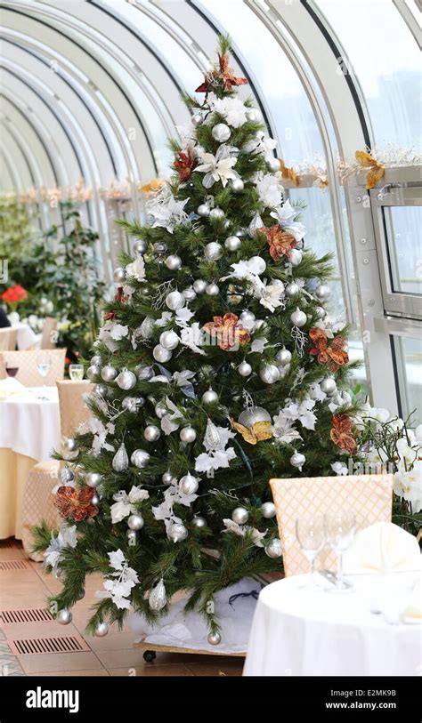 beautiful festive Christmas tree in the restaurant Stock Photo - Alamy