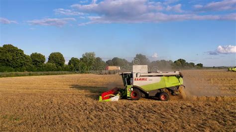 July 29 2019 Ukraine Bucha Harvester On A Wheat Field Harvests Top