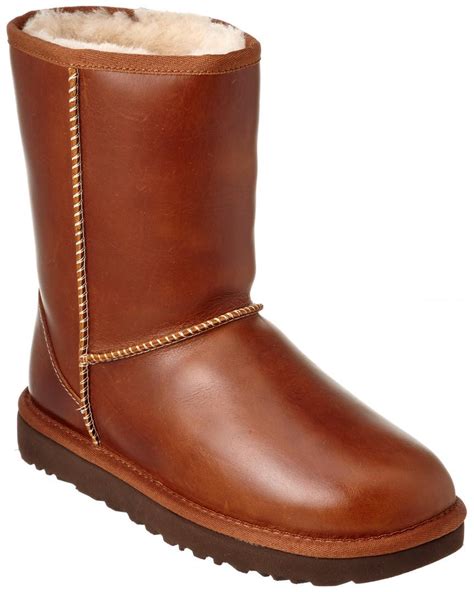 Ugg Women S Classic Short Water Resistant Leather Boot In Brown Lyst