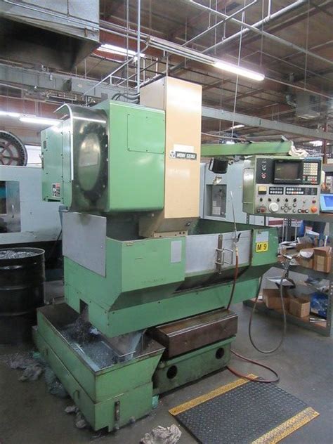 23 MORI SEIKI MV JUNIOR VERT CNC MACHINE CENTER Tauber Arons