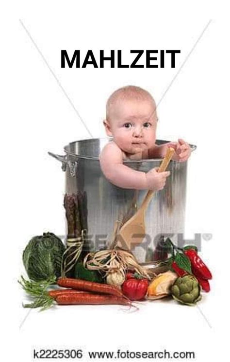 A Baby Sitting In A Bucket With Vegetables And Spices Around It That