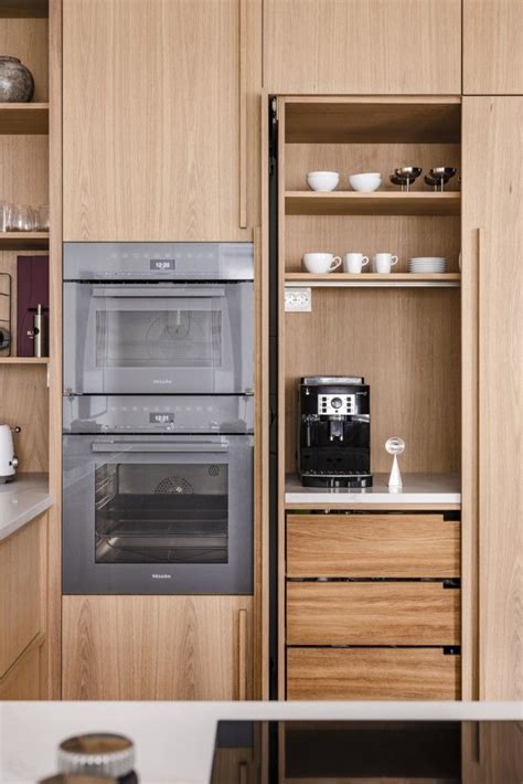 The Kitchen Is Clean And Ready To Be Used As An Appliance For Cooking