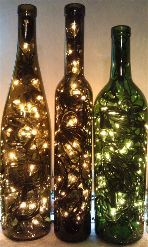 60 Ideias Para Reutilizar Garrafas De Vidro Na Decoração Garrafa De Vinho Iluminada Garrafas