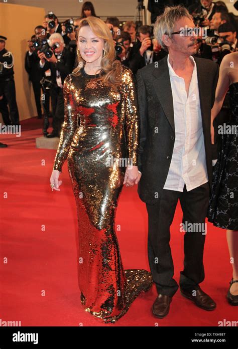 Kylie Minogue L And Leos Carax Arrive On The Red Carpet Before The