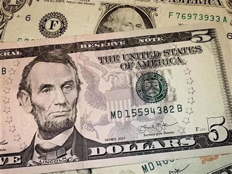 Abraham Abe Lincoln face portrait on 5 dollar bill macro. United states ...