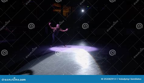 Gorgeous Ice Skater Girl Dancing On Dark Empty Ice Rink In Spotlight Figure Skating Stock Video