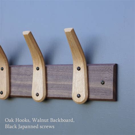 Curved Wooden Coat Hooks And Backboard By Layertree