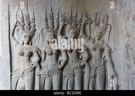 Detail of Devatas female stone wall carving at Angkor Wat temple in ...