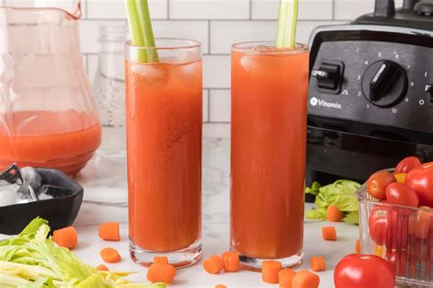 Download Carrot Juice With Tomatoes And Celery Sticks Wallpaper