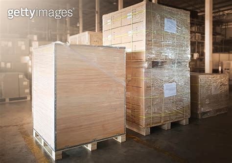 Package Boxes Wrapped Plastic Flim On Pallets At Storage Warehouse