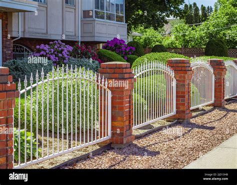 Brick And Iron Fence