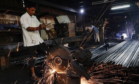 India's manufacturing sector activity hits 11-month high in November | Economy News | Zee News