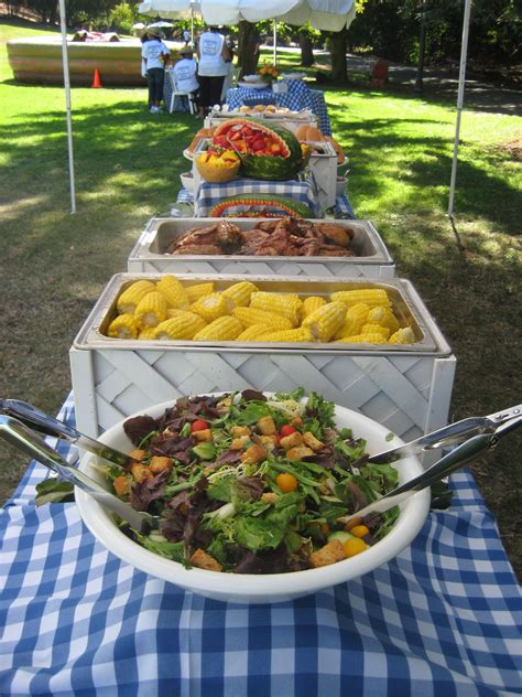 White Buffet Equipment On Blue Gingham Linen For Wedding Buffet Food