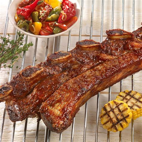 Ribs de bœuf et maïs grillé sauce barbecue et piperade de légumes