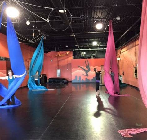 Students Practicing On Aerial Silk In Class Aerial Cirque Over Denver