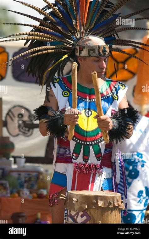 Aztec Indian Playing A Drum During A Celebration For The Day Of The