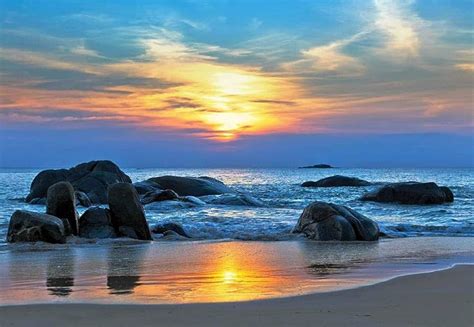 wallpaper sea rocks sunset  stock photo   rocky beach  sunset