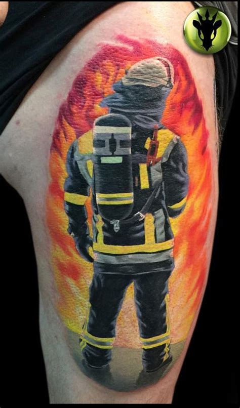 A Man With A Fireman Tattoo On His Leg