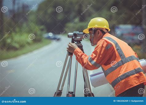 Surveyor Engineers Work On Road Construction Site Stock Image Image