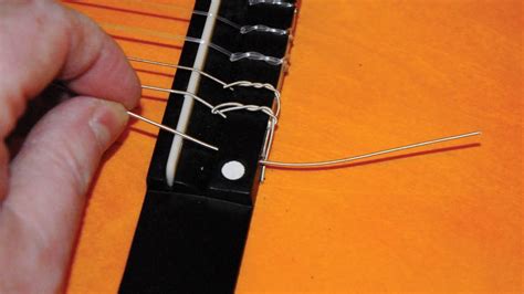 Guitar Setup How To Restring A Nylon String Classical Guitar Musicradar