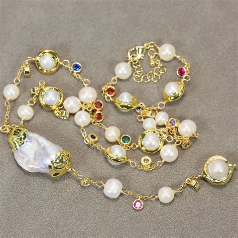 GG Freshwater Cultured Gray Keshi Pearl White Round Pearl With Gold