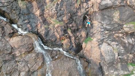 Drone Footage Captures Shocking Cliff Fall RTM RightThisMinute