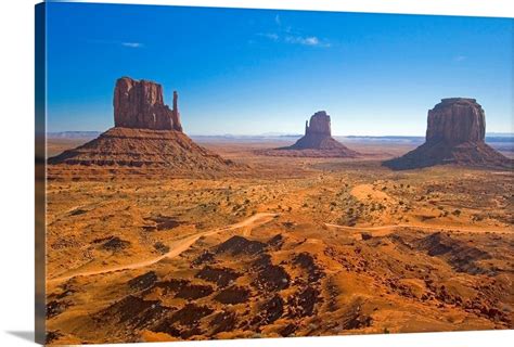 Monument Valley And The Three Mittens Rock Formations On A Clear Day