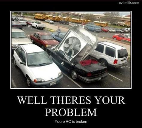 Cars Are Parked In A Parking Lot With Their Hoods Open And The Roof